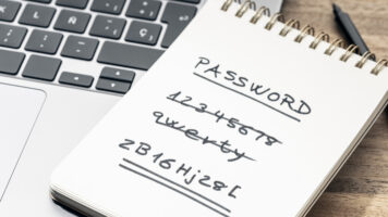 strong and weak easy password concept. handwritten text on notepad on laptop