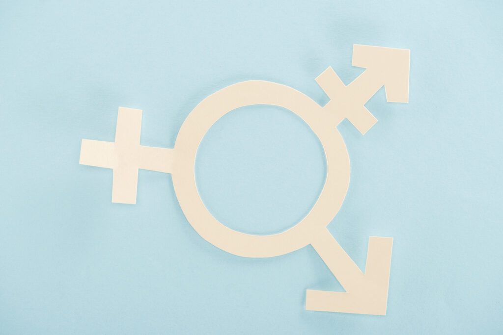 white paper gender sign on blue background, lgbt concept